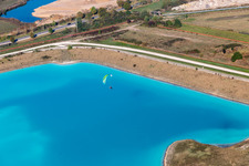 Brown - white salt fields for salt production in Rosières-aux-Salines in the state Meurthe et Moselle, France viewn from the air