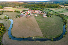 Curved loop of the riparian zones on the course of the river of Maas/Meuse around Autigny-la-Tour in Grand Est, France