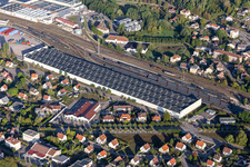Aerial view of Buildings and production halls on the food manufacturer's premises Nestle Waters Supply Est in Vittel in Grand Est, France