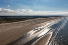 Cars riding on the Beach along the West coast of Northsea island in Fanoe in, Denmark