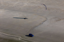 Aerial photograpy of Buggies and kite surfers on the sandy beach in Fanø in the state South Denmark, Denmark