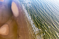 Aerial view of West beach at high tide in Fanø in the state South Denmark, Denmark