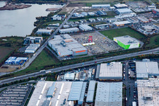 XXXL-sized chair on the parkinkg of the furniture market XXXLutz Neubert Schweinfurt in Gewebegebiet Maintal at dusk in Schweinfurt in the state Bavaria, Germany