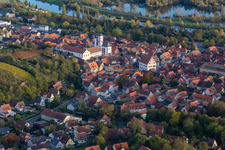 Aerial view of Town Hall building of the city administration on Rathausplatz and Pfarrkirche St. Augustinus in Dettelbach in the state Bavaria, Germany