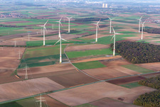 Wind turbine windmills on a field in Schwanfeld in the state Bavaria, Germany