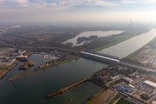 Rail and Street bridges with a huge tent for renovation purposes across the Rhine river between Karlsruhe and Woerth am Rhein in the state Rhineland-Palatinate, Germany
