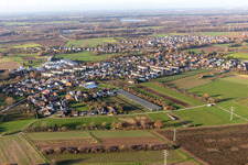 Agricultural land and field borders surround the settlement area of the village in Weitenung in the state Baden-Wurttemberg, Germany