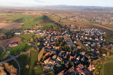 Village view on the edge of agricultural fields and land and sporting fields in the district Buehl in Offenburg in the state Baden-Wurttemberg, Germany