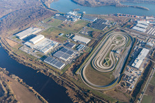 Test track for lorrys of Daimler with industrial estate of Europack GmbH, MEG GmbH, Netto, Papierfabrik Palm GmbH & Co. KG and NUSS-Unternehmensgruppe in Woerth am Rhein in the state Rhineland-Palatinate, Germany