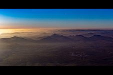 Forest and mountain scenery of Pfaelzerwald at sunset in Ilbesheim bei Landau in der Pfalz in the state Rhineland-Palatinate, Germany