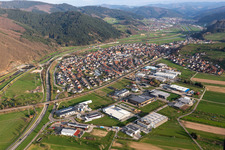 Location view of the streets and houses of residential areas in the valley of the Kinzig landscape surrounded by mountains in Steinach in the state Baden-Wuerttemberg, Germany