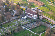 Grave rows on the grounds of the cemetery of Weingartenkirche in Offenburg in the state Baden-Wuerttemberg, Germany