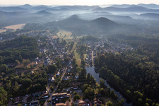 Surrounded by forest and forest areas center of the streets and houses and residential areas in Ludwigswinkel in the state Rhineland-Palatinate, Germany