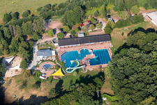 Only a few guests on the Waterslide on Swimming pool of the Waldschwimmbad Kandel due to the Corona-Pandemic in Kandel in the state Rhineland-Palatinate, Germany