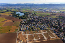 New development area "Mitten im Feld" and Odenwaldstr in Heddesheim in the state Baden-Wuerttemberg, Germany from the drone perspective