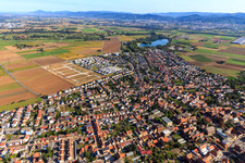 New development area "Mitten im Feld" and Odenwaldstr in Heddesheim in the state Baden-Wuerttemberg, Germany seen from a drone
