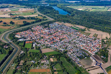 Aerial view of Village view on the edge of agricultural fields and land in Russheim in the state Baden-Wuerttemberg, Germany
