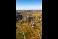 Oblique view of Autumnal discolored vegetation view town center on the edge of vineyards and wineries in the wine-growing area in Neuleiningen in the state Rhineland-Palatinate, Germany