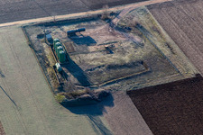 Aerial view of Tank and feed pump for oil production in the Rhine plain in Niederlauterbach in Grand Est, France