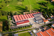 Aerial view of Building and production halls on the premises of Vogelsitze GmbH in Stupferich in the state Baden-Wurttemberg, Germany