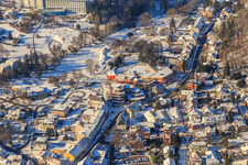 Winter aerial view in the snow of the Südpfalz Therme in the spa park in Bad Bergzabern in the state Rhineland-Palatinate, Germany