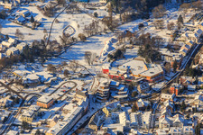 Aerial view of Winter aerial view in the snow of the Südpfalz Therme in the spa park in Bad Bergzabern in the state Rhineland-Palatinate, Germany