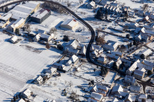 Winter aerial view in the snow from the Schlössl in Oberotterbach in the state Rhineland-Palatinate, Germany