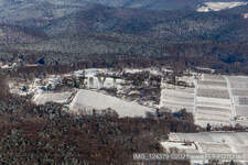Aerial view of Winter aerial view in the snow of garden plots near the forest in Dörrenbach in the state Rhineland-Palatinate, Germany