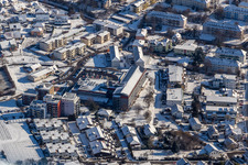 Winter aerial view in the snow of the hospital Bad Bergzabern in Bad Bergzabern in the state Rhineland-Palatinate, Germany