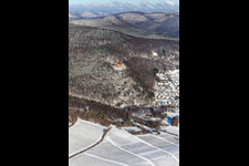Winter aerial view in the snow of Landeck Castle in Klingenmünster in the state Rhineland-Palatinate, Germany
