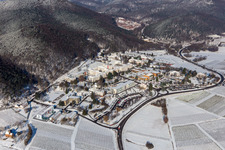 Wintry snowy hospital grounds of the Clinic Klinik fuer Kinder-/Jugendpsychiatrie and -psychotherapie in the district Pfalzklinik Landeck in Klingenmuenster in the state Rhineland-Palatinate, Germany