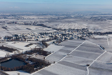 Winter aerial view in the snow in Göcklingen in the state Rhineland-Palatinate, Germany