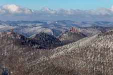 Winter aerial view in the snow of the three castles Trifels, Anebos Scharfenberg from the Birnbachtal in Waldrohrbach in the state Rhineland-Palatinate, Germany