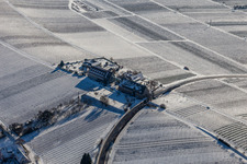 Aerial photograpy of Wintry snowy complex of the hotel building " Leinsweiler Hof " in Leinsweiler in the state Rhineland-Palatinate, Germany