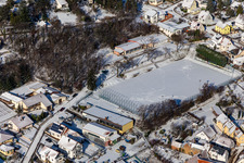 Winter aerial view in the snow of the sports field in Frankweiler in the state Rhineland-Palatinate, Germany