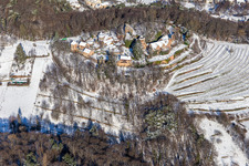 Wintry snowy building of the restaurant Schloss Kropsburg in Sankt Martin in the state Rhineland-Palatinate, Germany