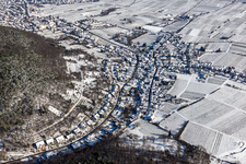 Winter aerial view in the snow in the district Hambach an der Weinstraße in Neustadt an der Weinstraße in the state Rhineland-Palatinate, Germany