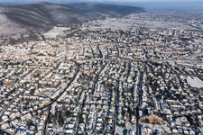 Aerial view of Winter aerial view in the snow in Neustadt an der Weinstraße in the state Rhineland-Palatinate, Germany