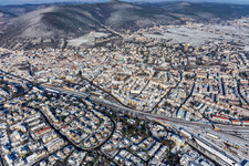Aerial view of Winter aerial view in the snow in Neustadt an der Weinstraße in the state Rhineland-Palatinate, Germany