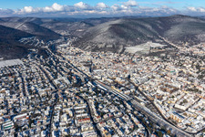 Aerial view of Winter aerial view in the snow in Neustadt an der Weinstraße in the state Rhineland-Palatinate, Germany