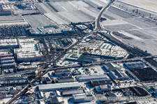 Winter aerial view in the snow Globus, Hela Profi, Dehner Markets in Neustadt an der Weinstraße in the state Rhineland-Palatinate, Germany