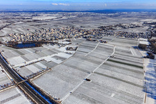 Aerial view of Winter aerial view in the snow with castle pond in Kirrweiler in the state Rhineland-Palatinate, Germany