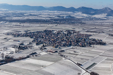 Wintry snowy town center on the edge of vineyards and wineries in the wine-growing area in Nussdorf in the state Rhineland-Palatinate, Germany