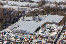 Winter aerial view of the snowy sports field in Winden in the state Rhineland-Palatinate, Germany