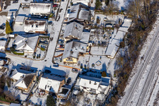 Winter aerial view in the snow from Im Rosengarten in Winden in the state Rhineland-Palatinate, Germany