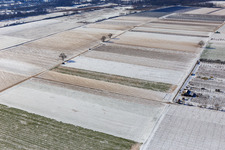 Aerial photograpy of Snow-covered fields in winter in Billigheim-Ingenheim in the state Rhineland-Palatinate, Germany
