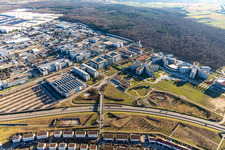 Aerial view of Star-shaped office buildings of the SAP Deutschland SE & Co. KG at the forest edged in Walldorf in the state Baden-Wuerttemberg
