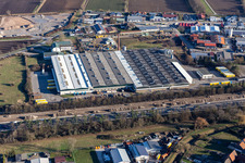 Aerial view of Buildings and production halls on the factory premises of the Smurfit Kappa Wellpappe Suedwest GmbH in Sankt Leon-Rot in the state Baden-Wuerttemberg, Germany