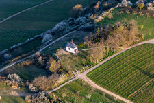 Aerial view of "Kleine Kalmit" chapel in the Kleine Kalmit nature reserve on Easter morning with spring bloom in Ilbesheim bei Landau in der Pfalz in the state Rhineland-Palatinate