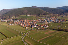 Village - view on the edge of agricultural fields and farmland in spring time in Sankt Martin in the state Rhineland-Palatinate, Germany